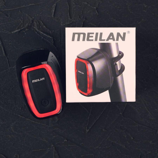 Meilan X6 inteligente USB trasera recargable LED